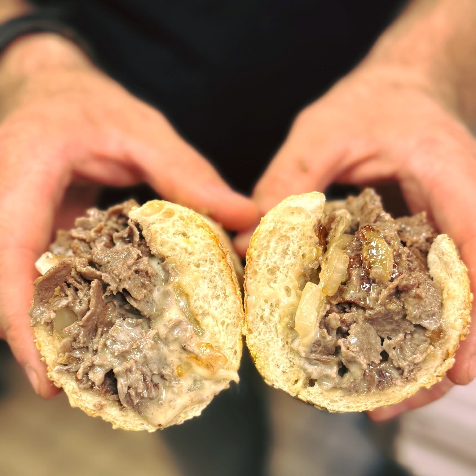 Ron's cheesesteaks features hormone-free beef and Cooper Sharp American cheese.